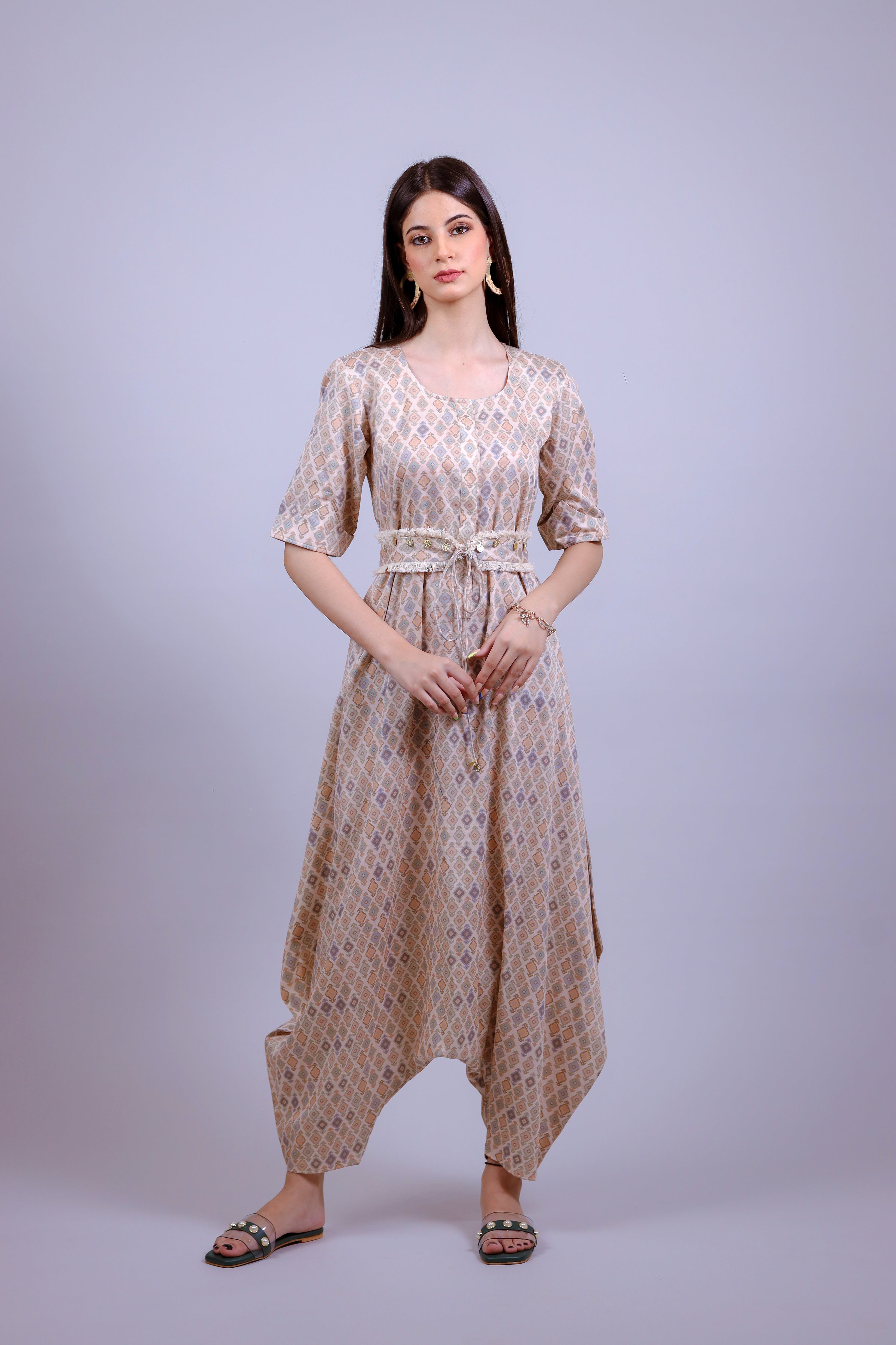 Powder Peach geometric jumsuit with belt - Neetika Chopra