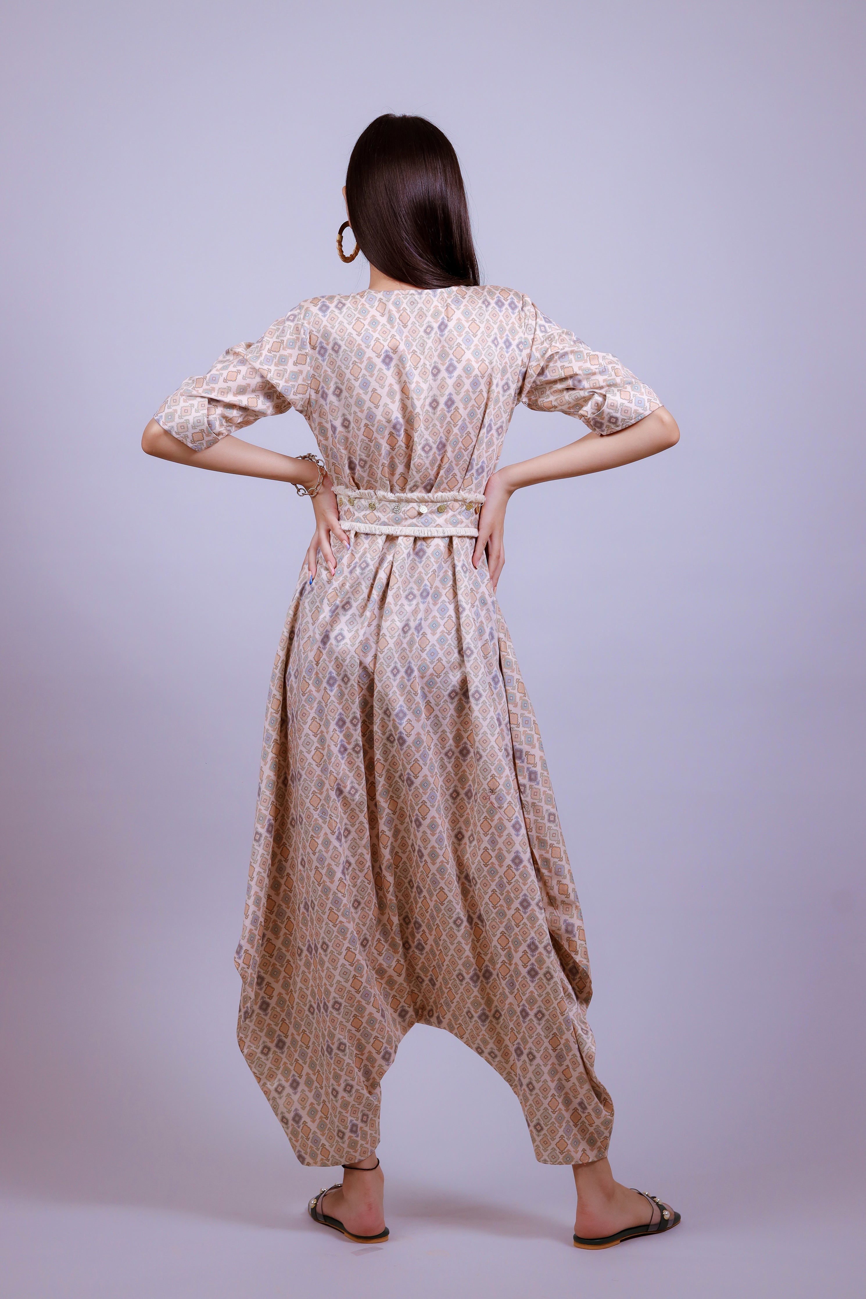 Powder Peach geometric jumsuit with belt - Neetika Chopra