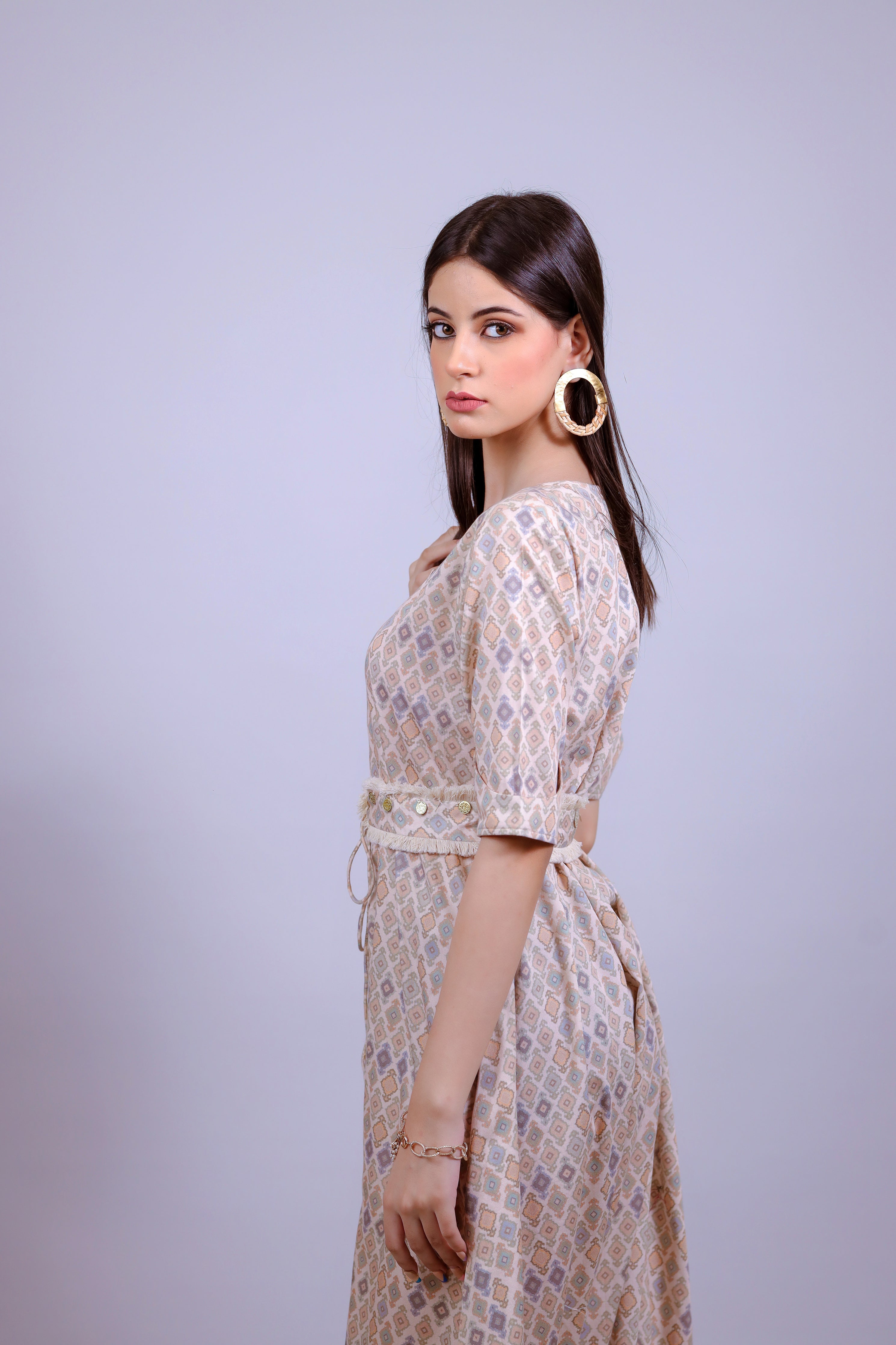 Powder Peach geometric jumsuit with belt - Neetika Chopra