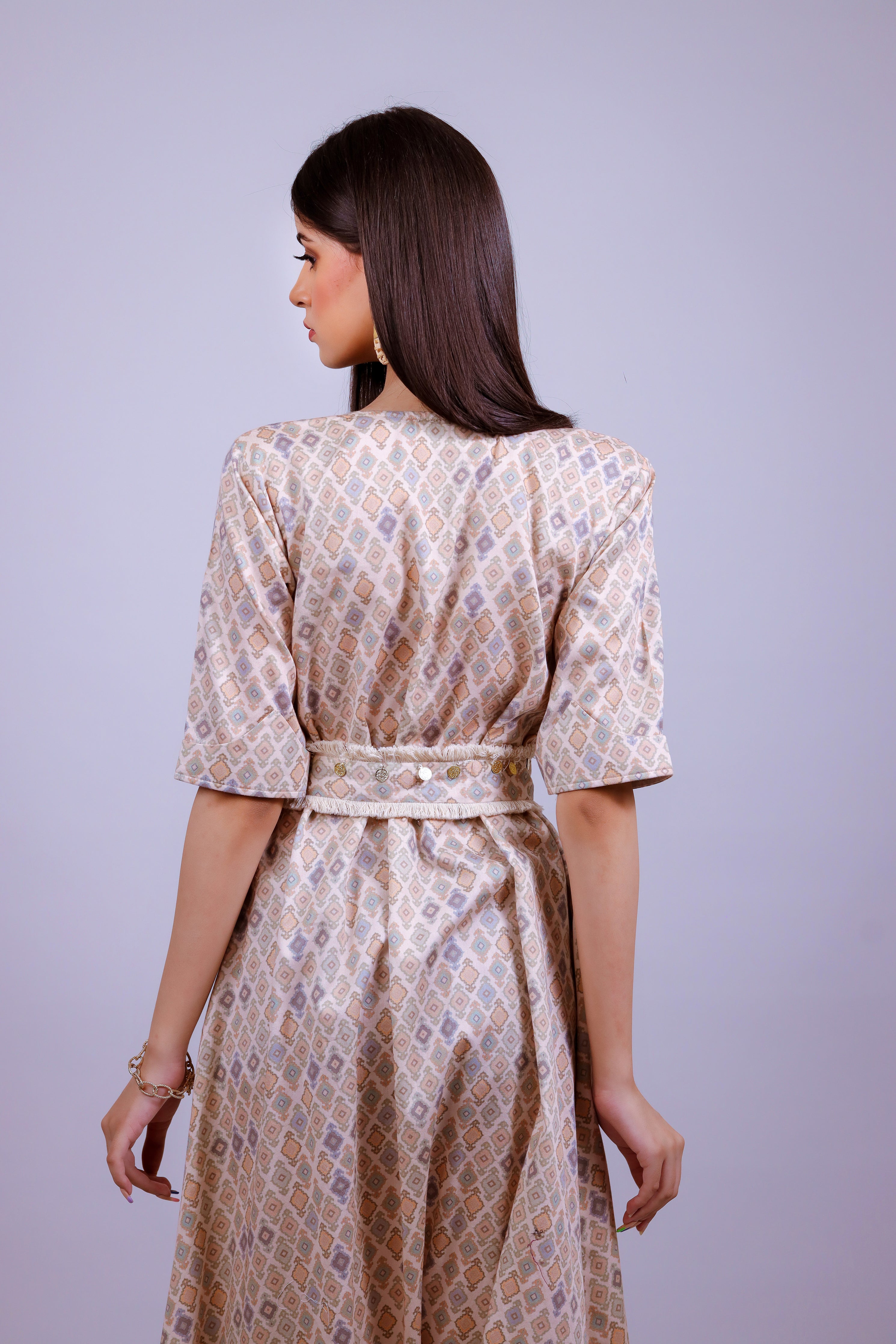 Powder Peach geometric jumsuit with belt - Neetika Chopra