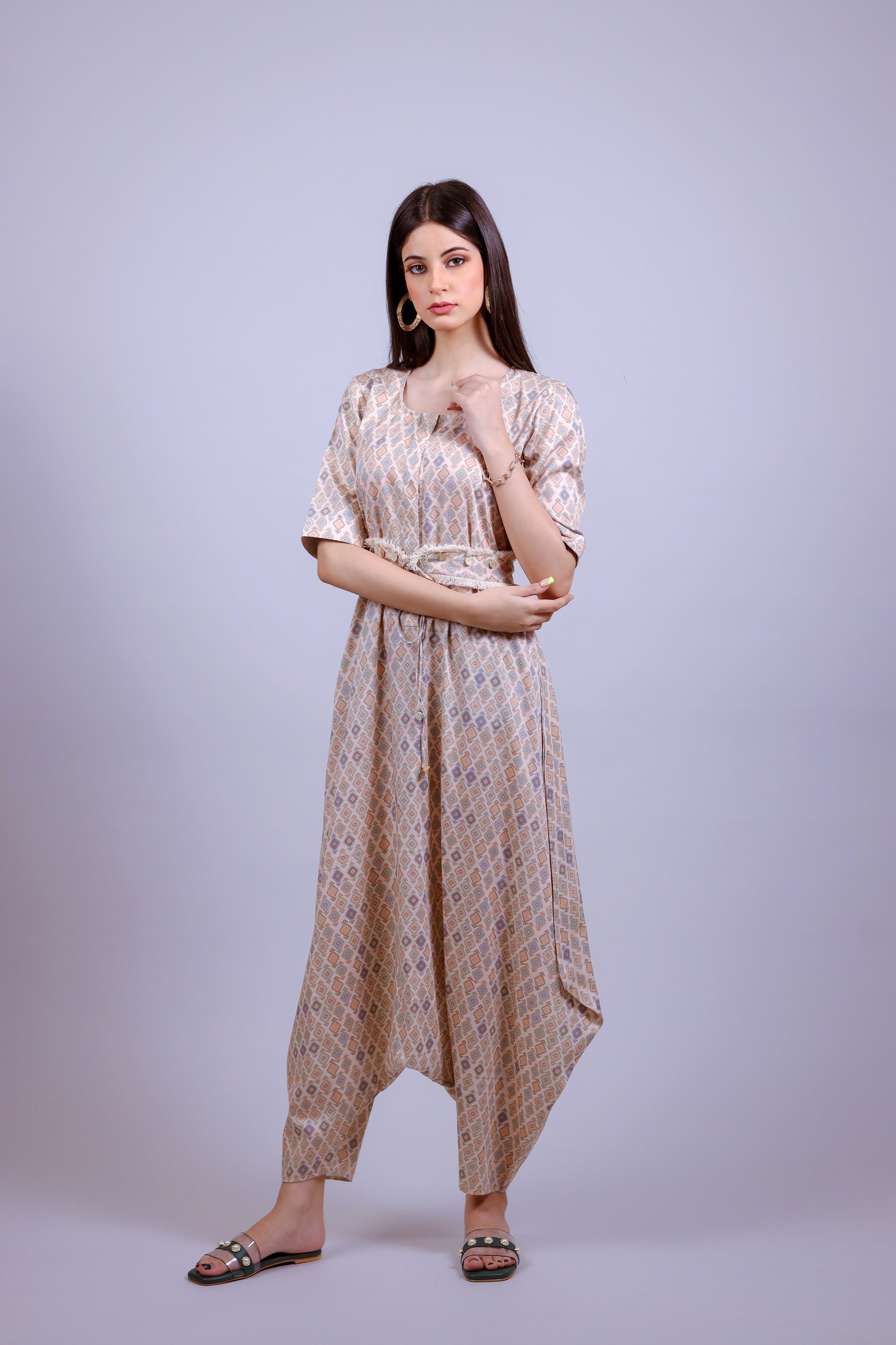 Powder Peach geometric jumsuit with belt - Neetika Chopra